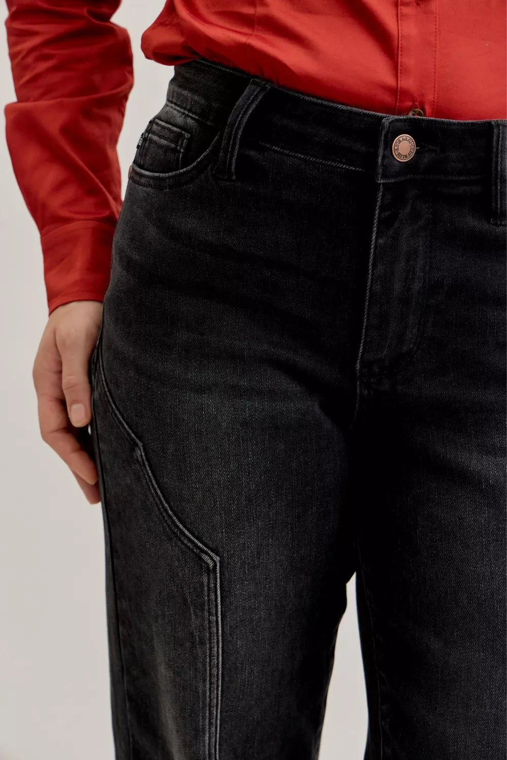 Mid-rise Judy Blue straight jeans with western seam detail, showcasing classic denim style and trendy design.