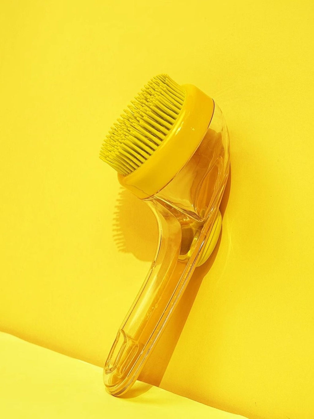 Soft pet shower brush by Trendsi with gentle bristles for cleaning cats and small dogs during bath time.
