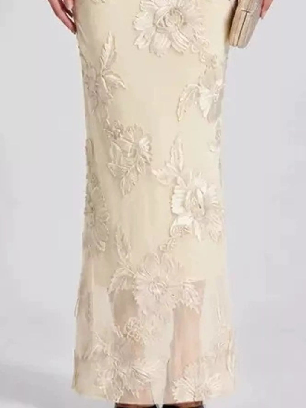 One-shoulder floral embroidered maxi dress by Trendsi, featuring vibrant floral patterns and flowing fabric.
