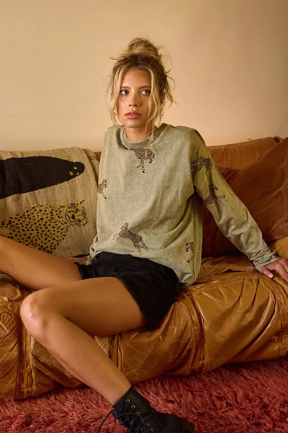 Mineroshop Mineral Wash Cheetah Print Long Sleeve Top with a relaxed fit and trendy animal pattern, styled with casual fashion.