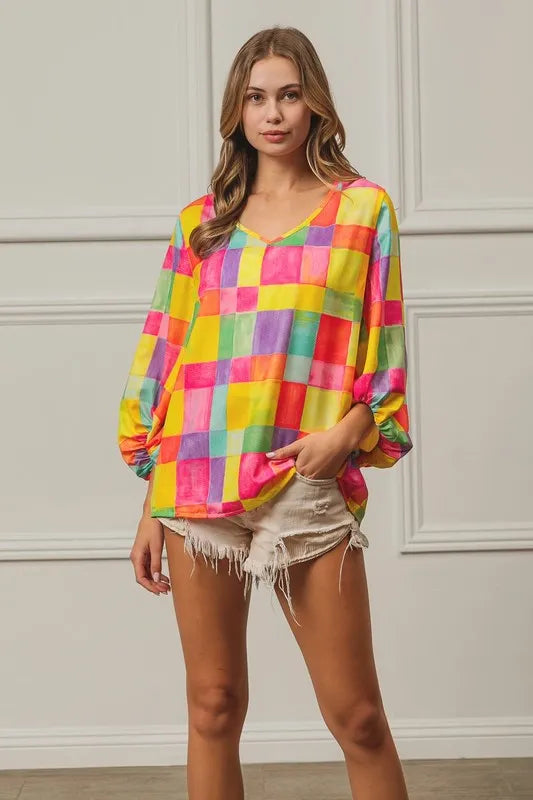 Colorful BiBi Multi Block Bubble Pop Balloon top by Trendsi, featuring vibrant bubbles and playful design.