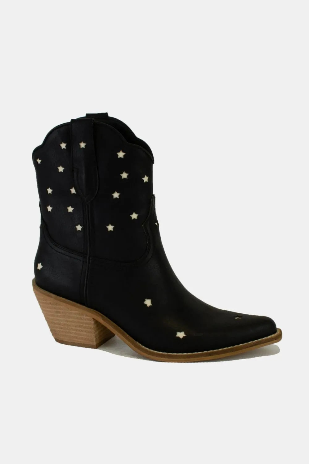 Beast Fashion faux leather star-shaped cutouts point toe boots by Trendsi, featuring a sleek black design and star details.