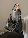 Chain detail crossbody bag with sleek design and adjustable strap, featuring a trendy and stylish look from Trendsi.