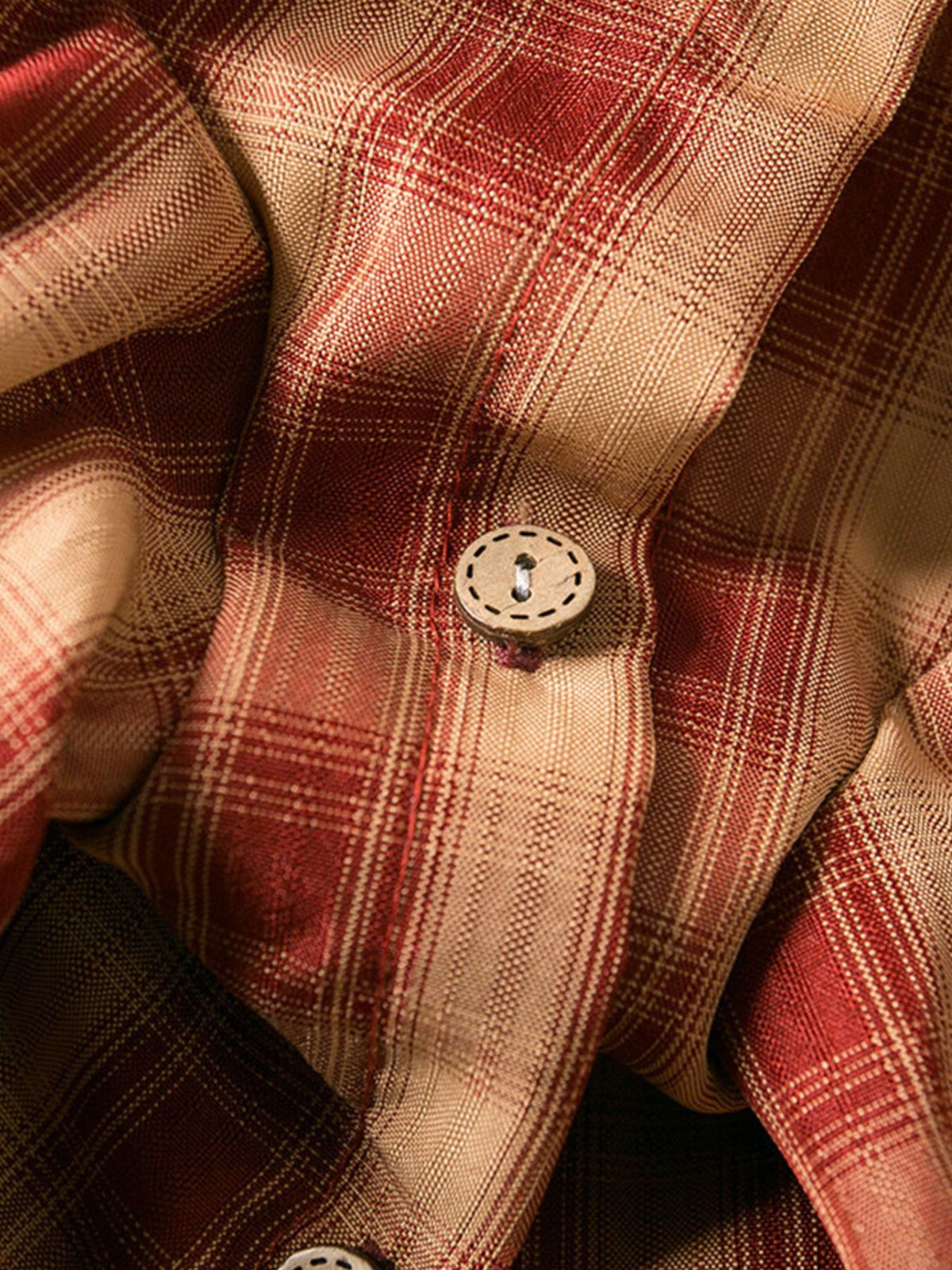 Plaid button-down pet shirt from Trendsi featuring a red and black checkered design for dogs or cats.