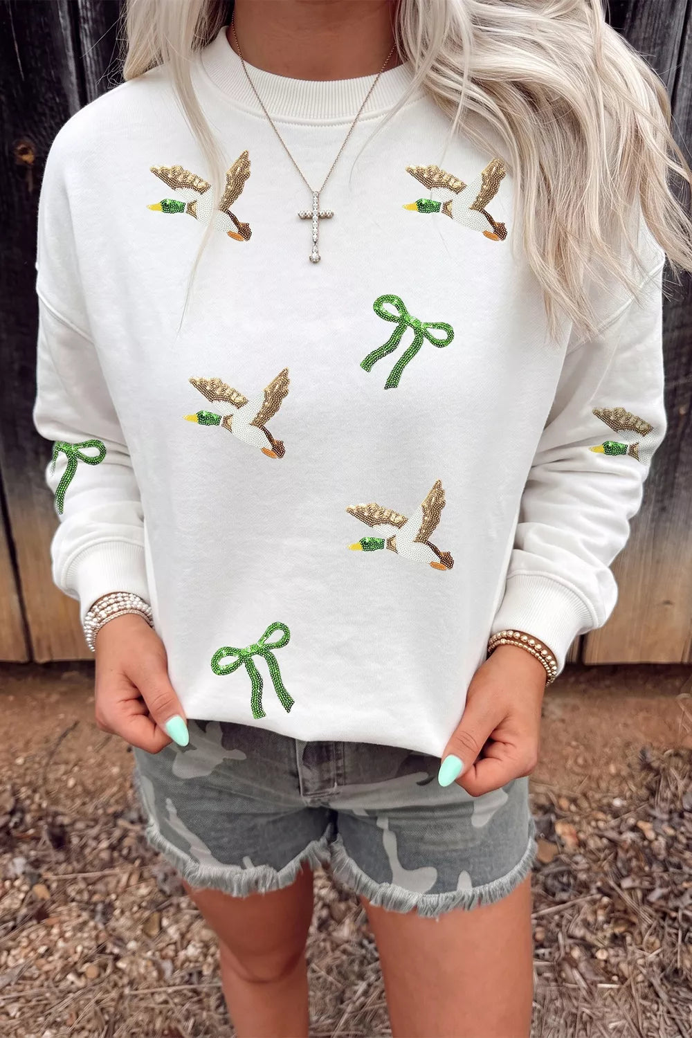 White sequin mallard bow crewneck sweatshirt