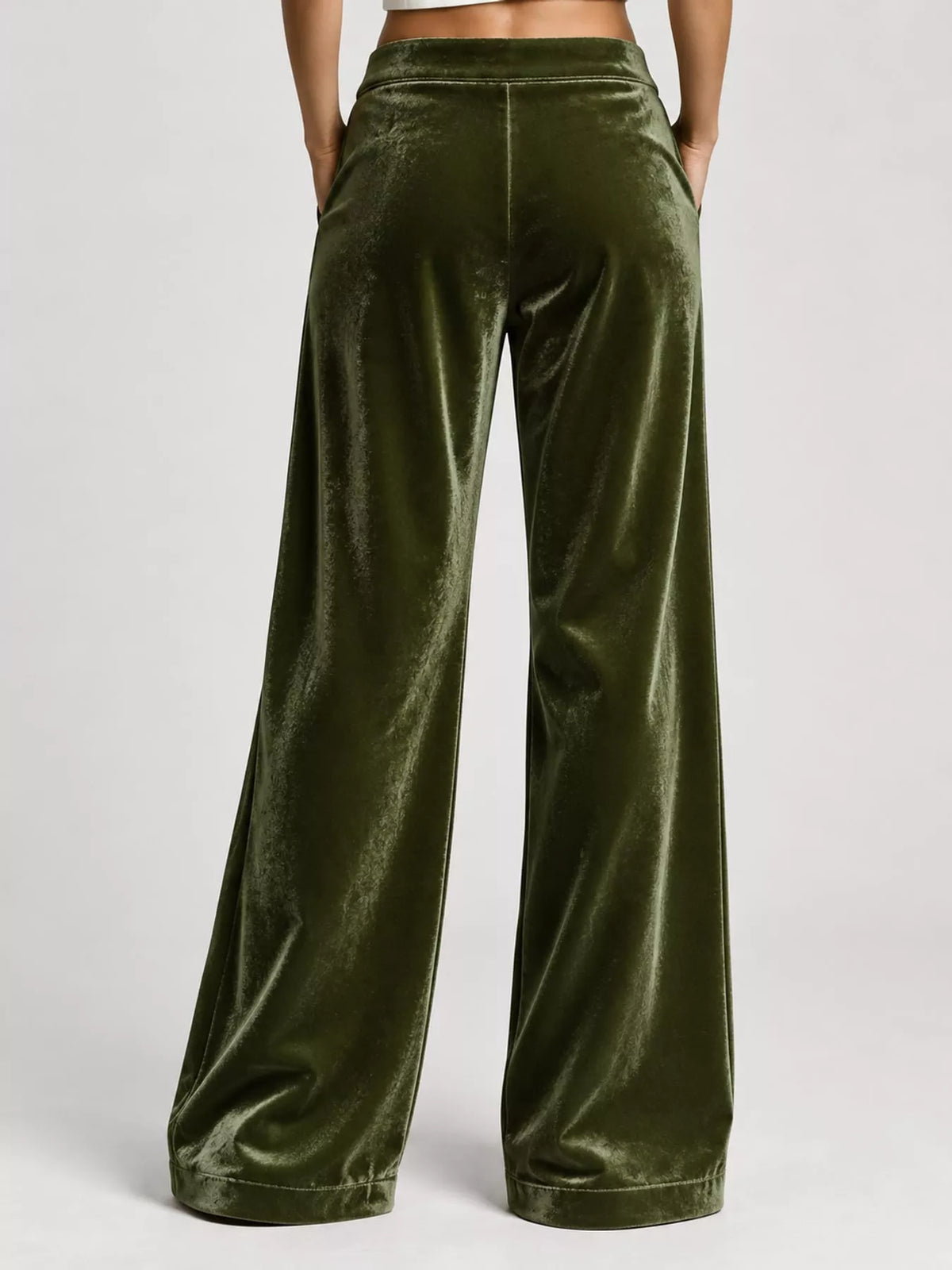 Plus size high-waisted velvet wide-leg pants with pockets, stylish and comfortable for a trendy look.