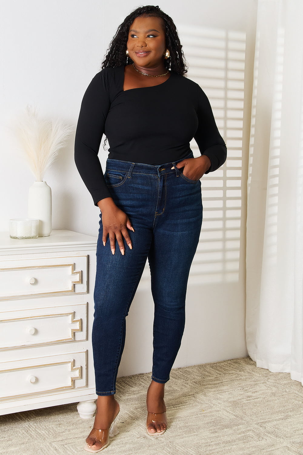 Basic Bae asymmetrical neck long sleeve top by Trendsi, featuring a stylish design with a unique neckline and comfortable fit.