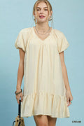 Umgee ruffle hem shift mini dress with floral print, sleeveless design, and relaxed fit, ideal for casual summer wear.