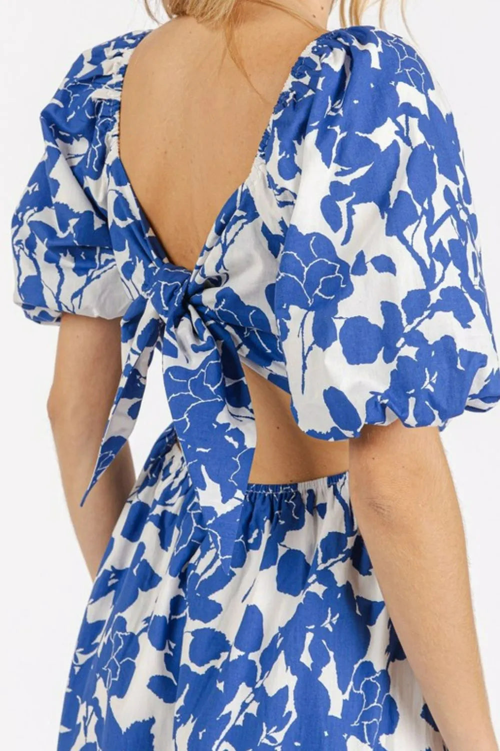 Trendsi Mittoshop floral sweetheart neck puff sleeve dress with cutout back and feminine design, perfect for stylish occasions.