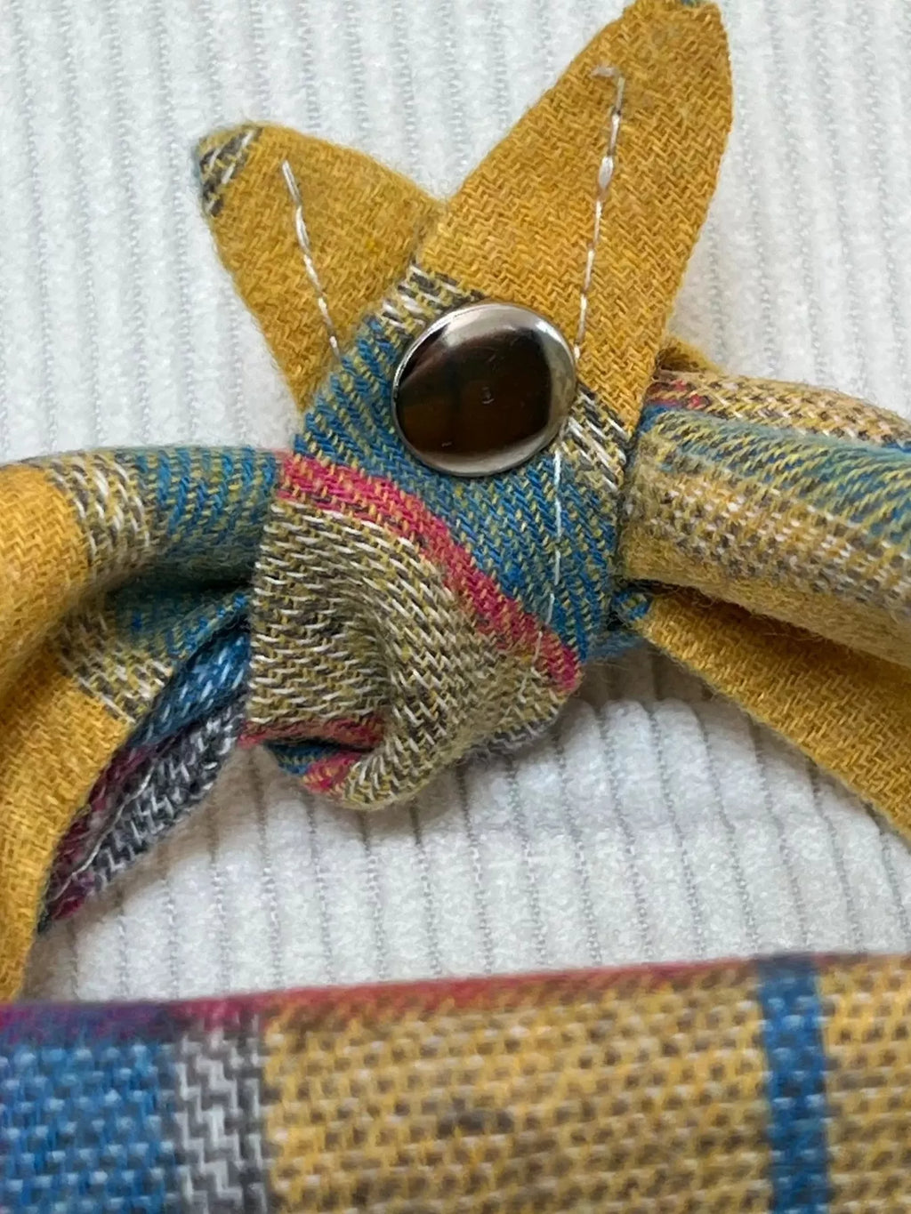 Plaid pet scarf from Trendsi featuring a soft, stylish pattern suitable for small to medium dogs and cats.