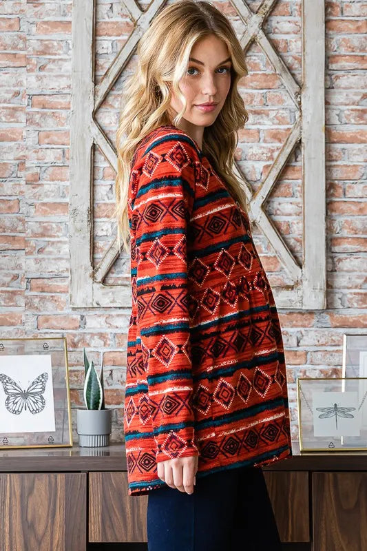 Heimish full size long sleeve babydoll top with geometric button details, stylish and comfortable for casual wear.