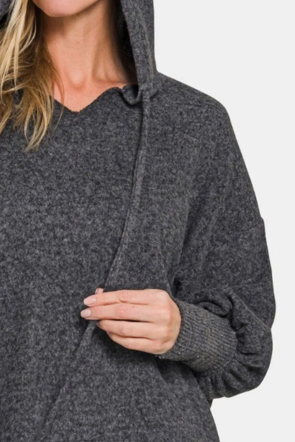 Brushed hacci drop shoulder cropped hoodie by Trendsi, featuring a cozy, relaxed fit with long sleeves and a casual style.