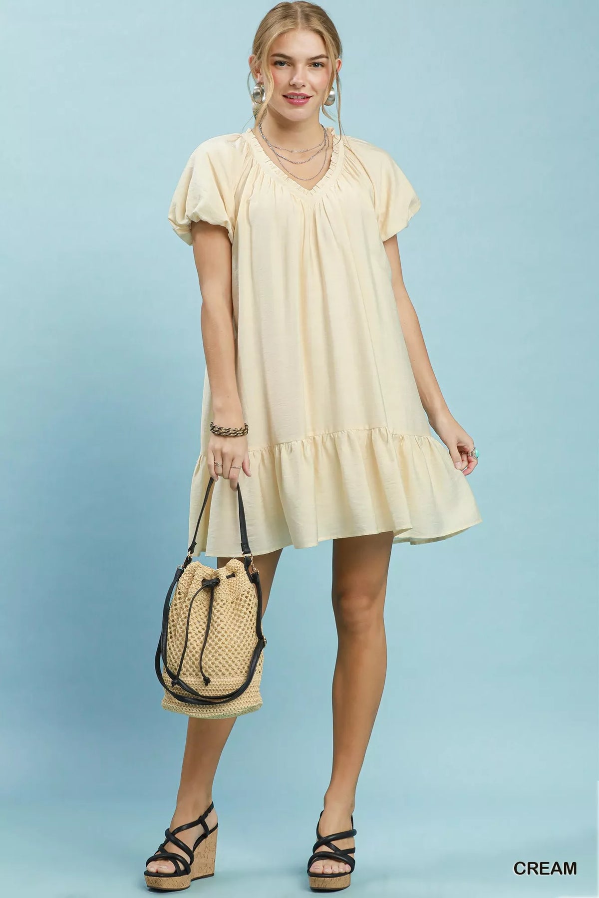 Umgee ruffle hem shift mini dress in soft fabric with a stylish ruffled hem, perfect for casual and summer wear.