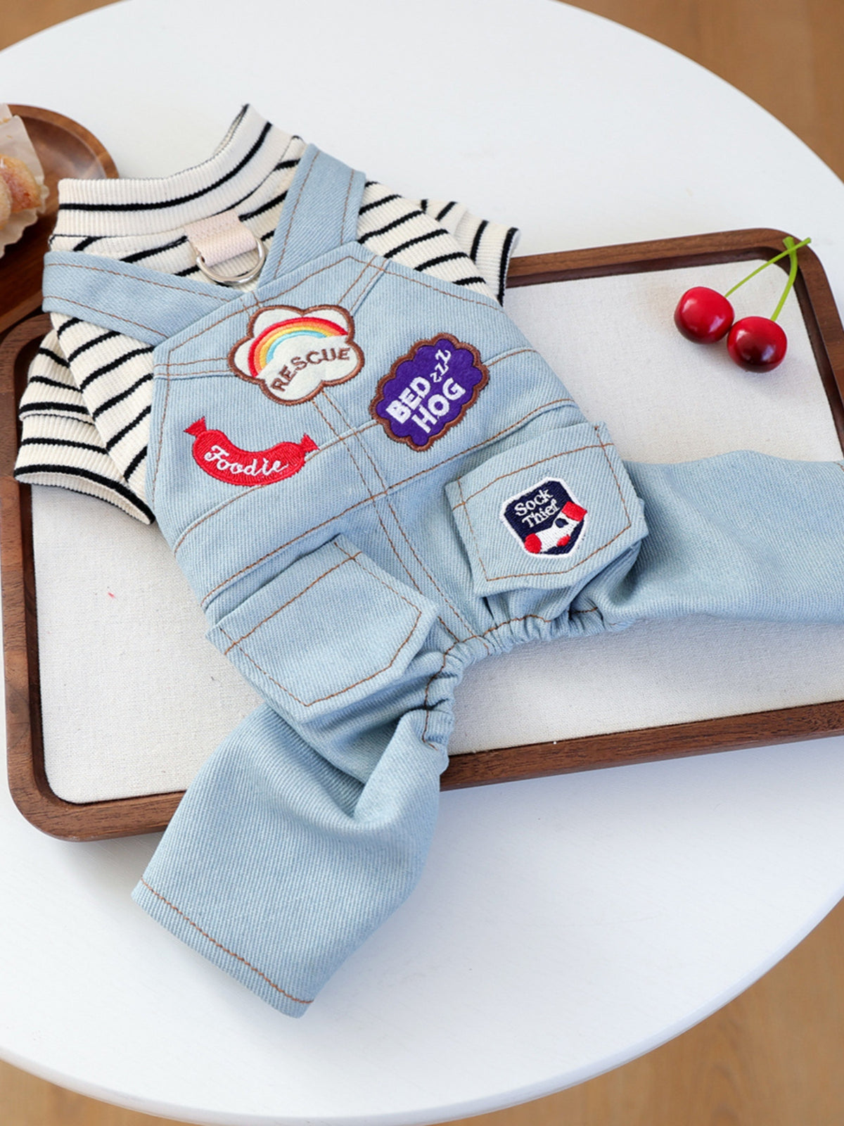 Denim patchwork pet jumpsuit from Trendsi featuring a stylish, comfortable design for dogs or cats.