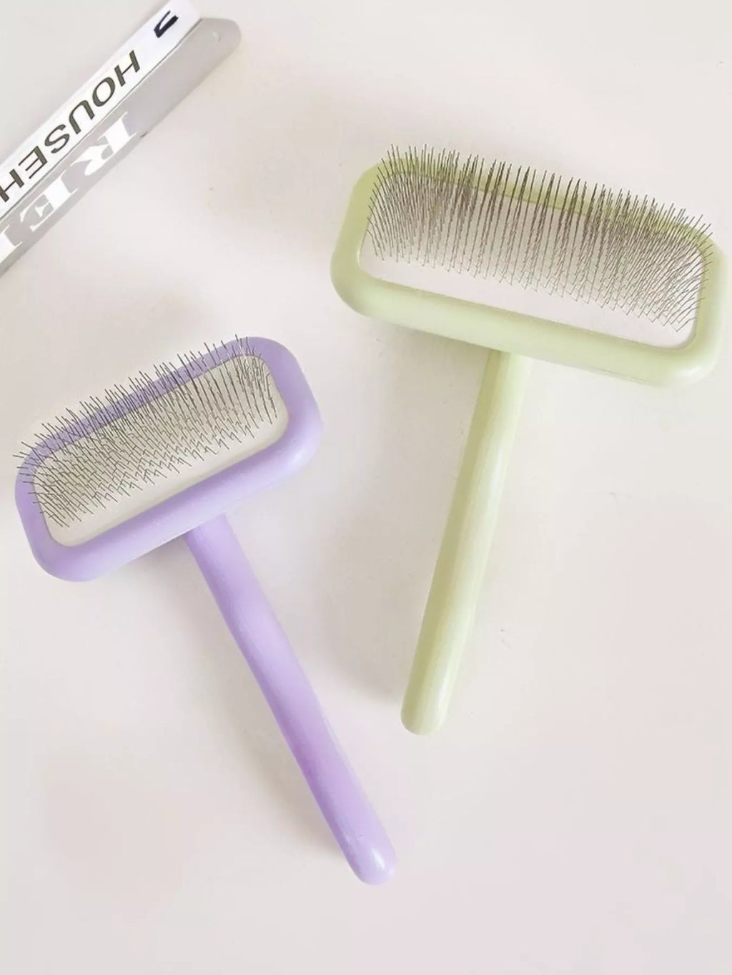 Trendsi gentle pet hair remover slicker brush with fine metal bristles for removing loose fur from cats and dogs.