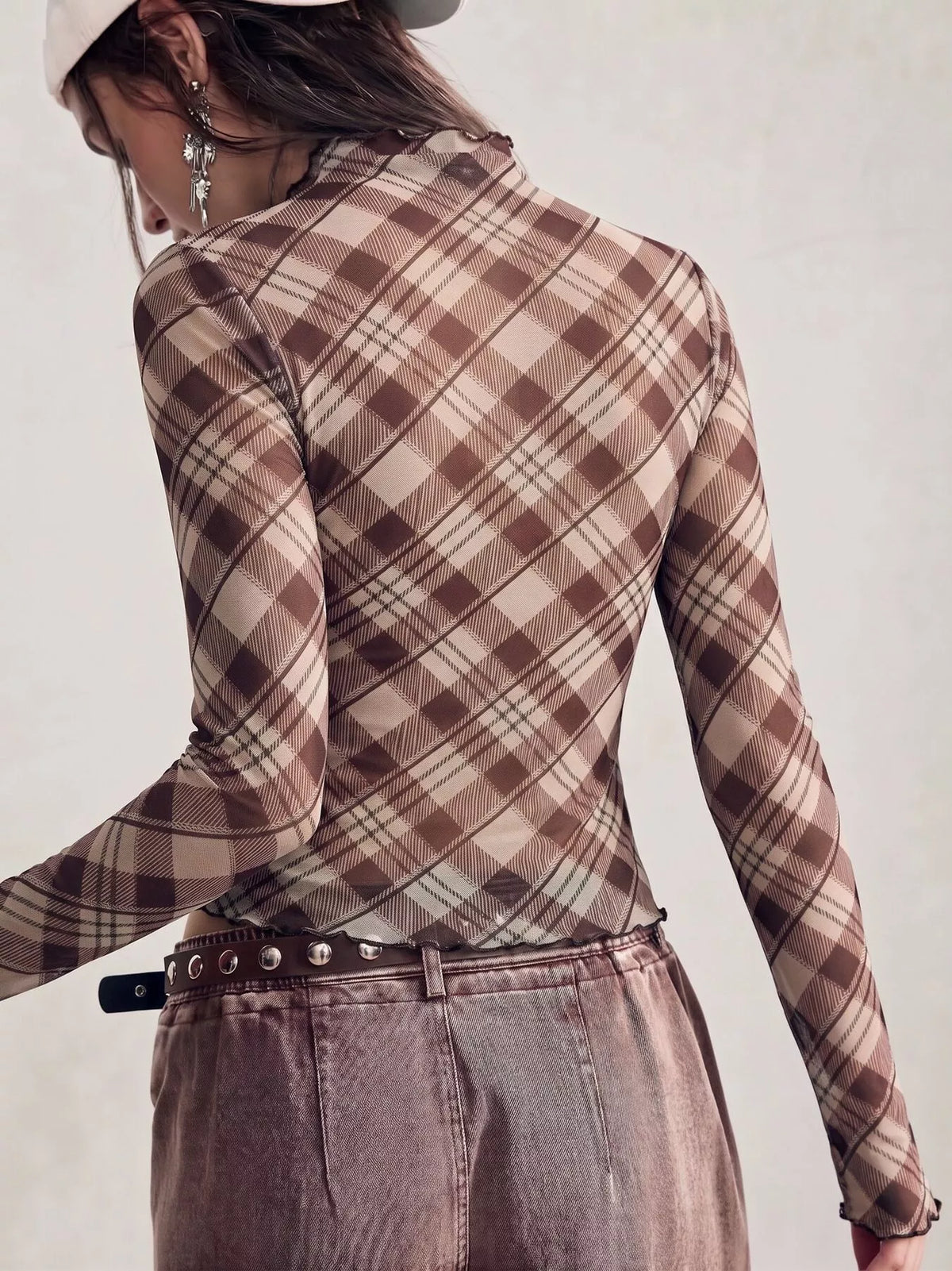 Sheer mesh plaid long sleeve mock neck T-shirt from Trendsi featuring a stylish pattern and fitted design.