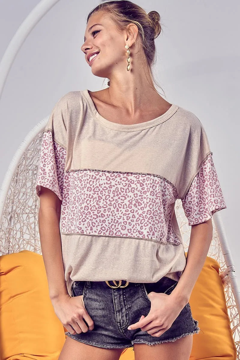 BiBi Triblend Knit top with leopard block out stitching, showcasing trendy animal print and stylish knit fabric.