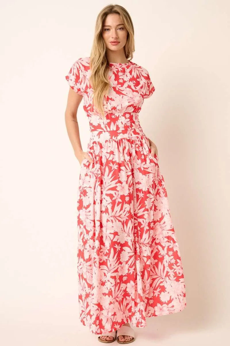 Tropical print top and skirt set by Trendsi, featuring vibrant floral patterns and lightweight fabric, perfect for warm weather.