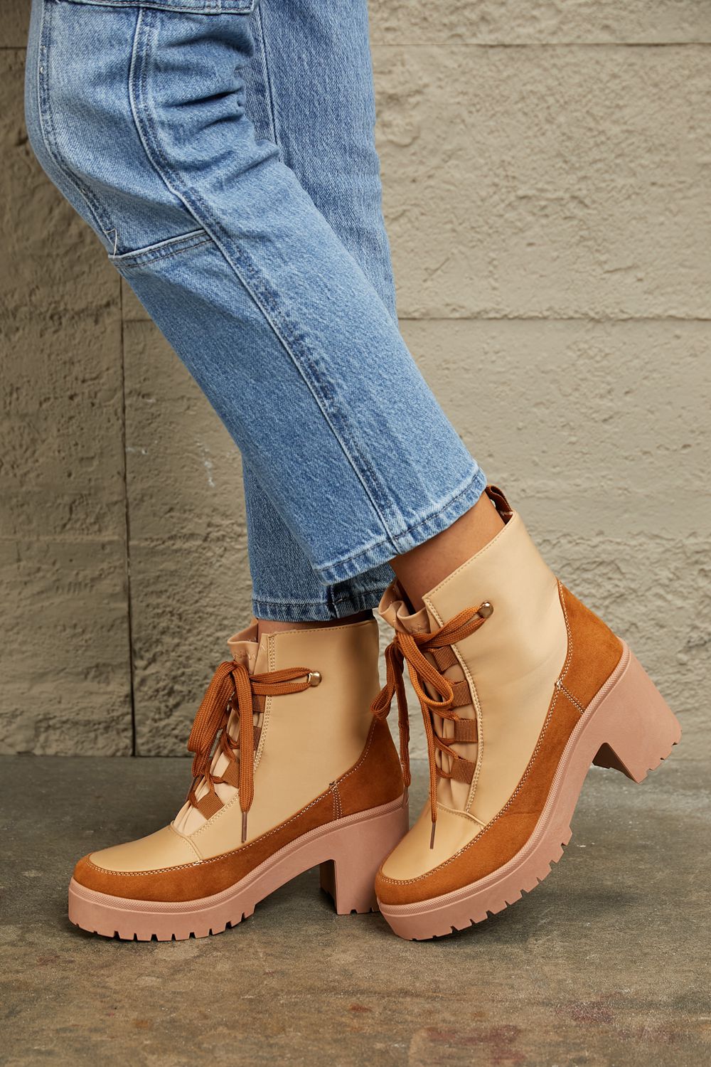 East Lion Corp lace-up lug booties with chunky soles and premium leather, stylish ankle boots for a rugged, trendy look