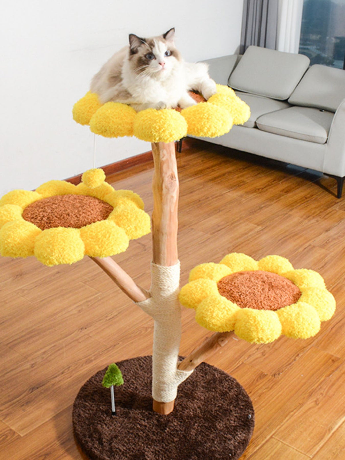 Sunflower multi-level cat tree and condo by Trendsi with sisal scratching posts, cozy hideouts, and platforms for cats to play and rest.