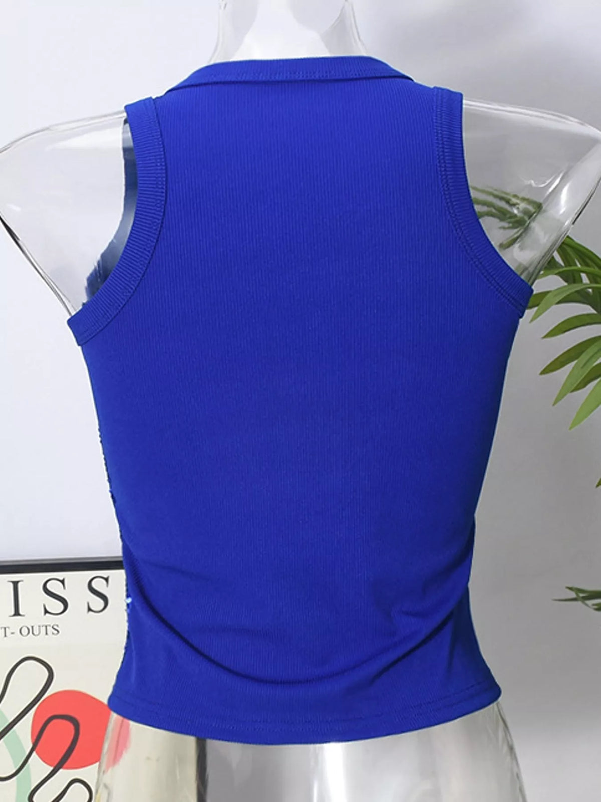 Sequin round neck tank top by Trendsi featuring shiny sequins and a classic sleeveless design on a white background