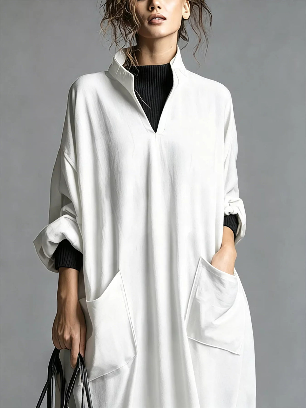 Plus size loose-fit mock neck midi dress with pockets by Trendsi, featuring a full size, comfortable and stylish design.