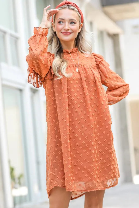 Lovely textured woven dress with ruffle shoulders by Trendsi, featuring a stylish design and intricate fabric details.