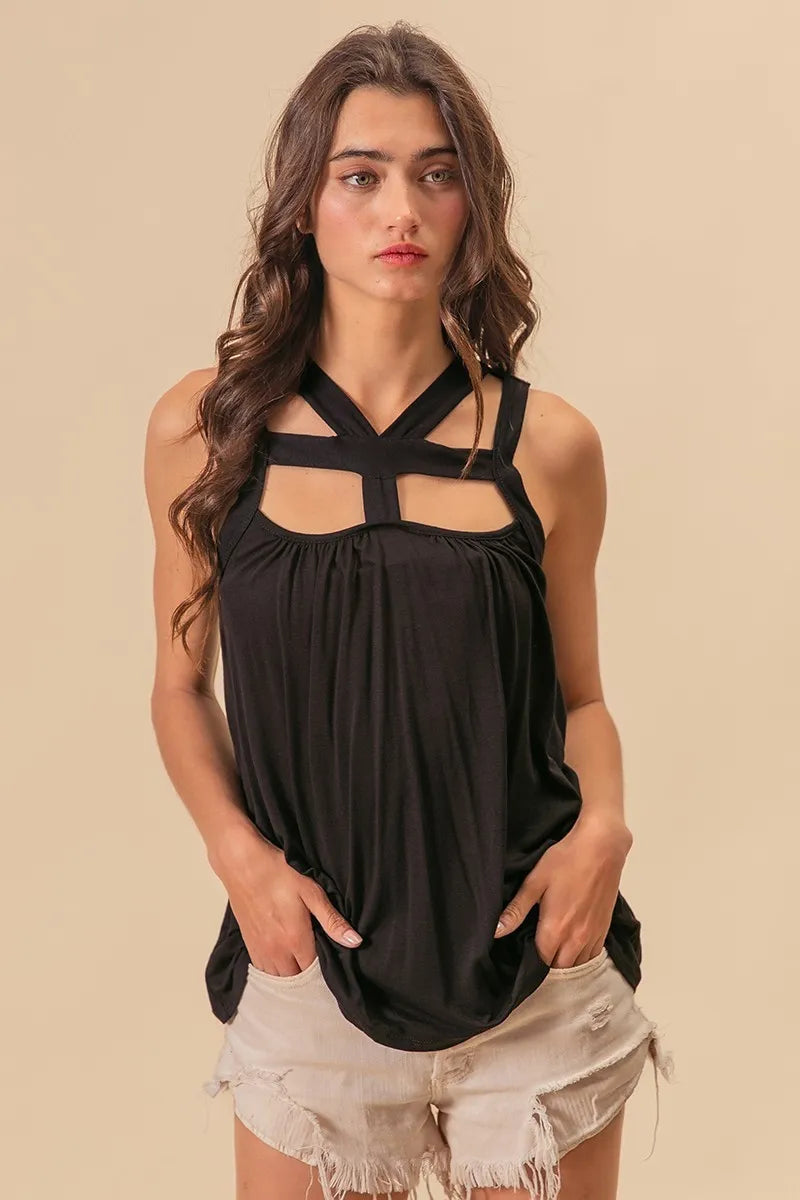 BiBi Rayon Span Jersey top with cut-out details and strap accents featuring trendy, fitted design from Trendsi.