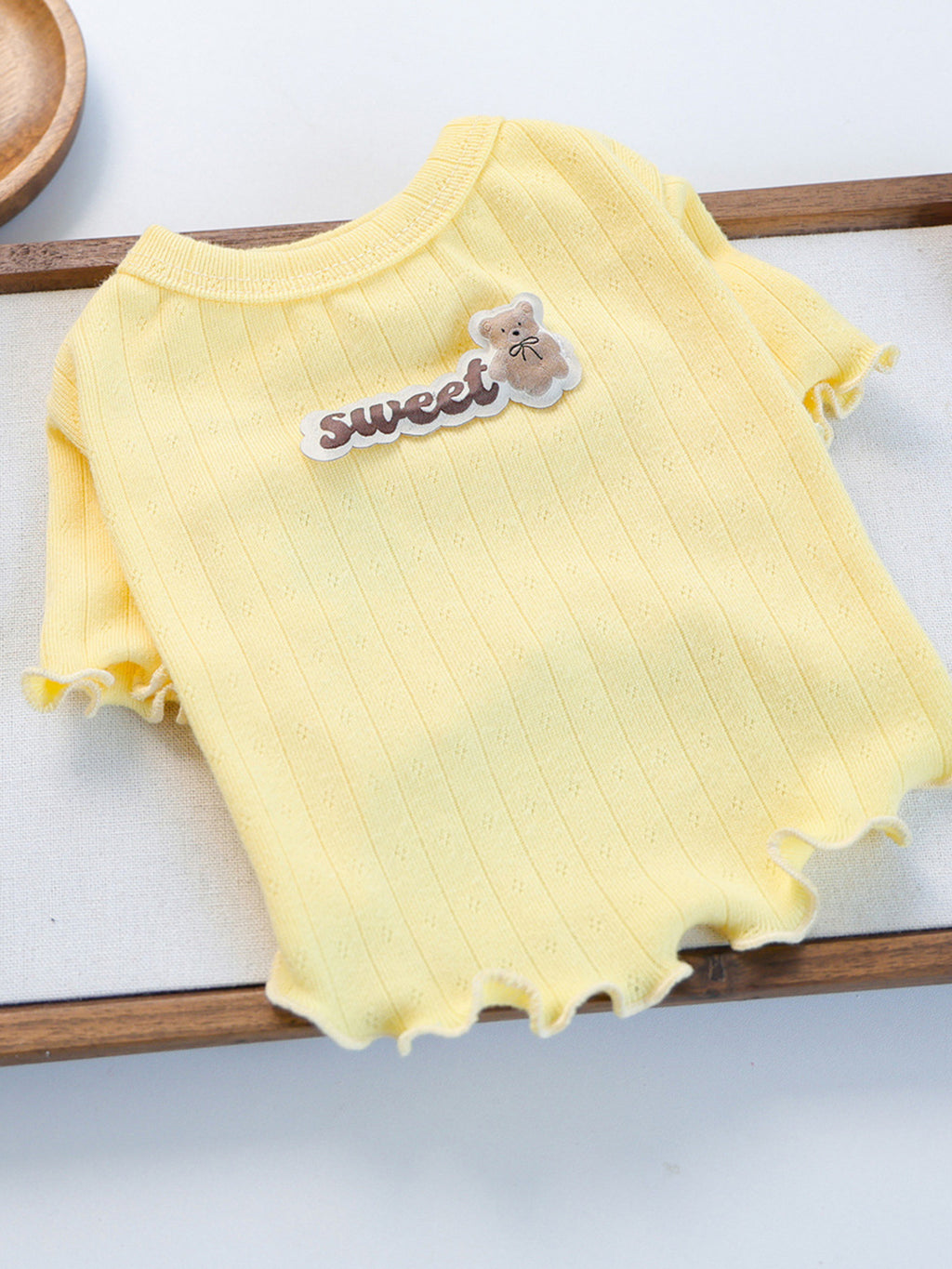 Sweet Bear Patch ribbed pet top by Trendsi featuring a cute bear patch design and ribbed fabric for cozy comfort.