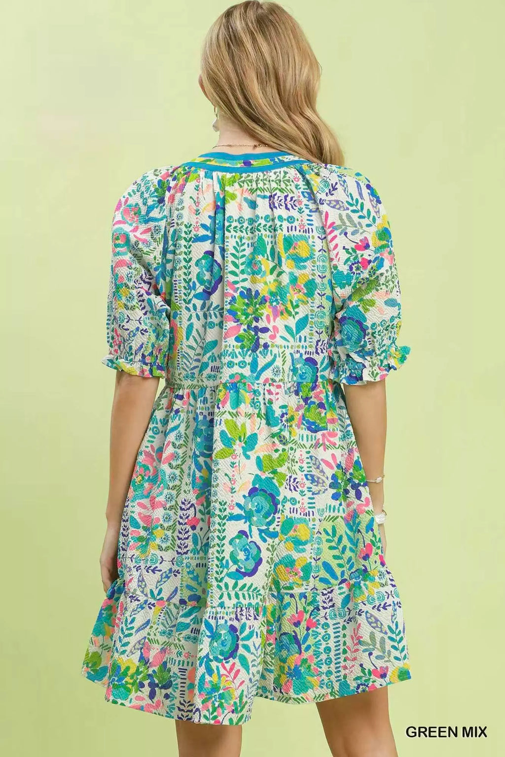 Umgee botanical print puff sleeve tiered dress featuring a mix of floral patterns and lightweight fabric, stylish and feminine.
