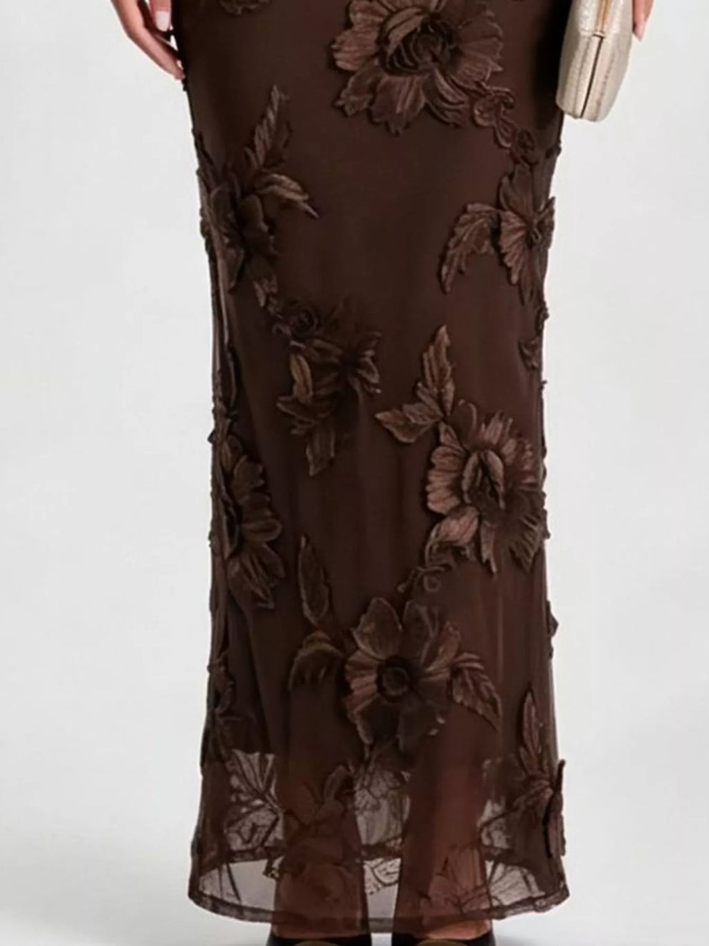 One-shoulder floral embroidered maxi dress by Trendsi featuring colorful floral embroidery and flowing fabric.
