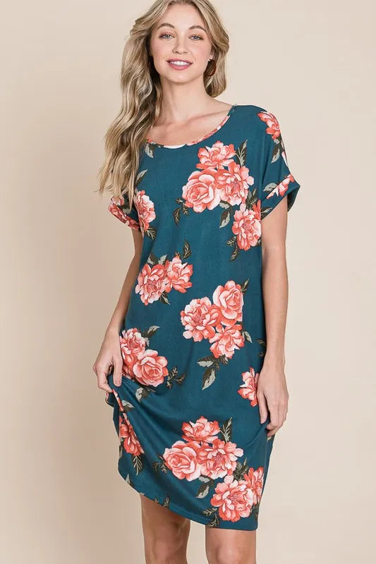 Trendsi BOMBOM floral round neck short tee dress with pockets, featuring a vibrant floral print and casual fit.