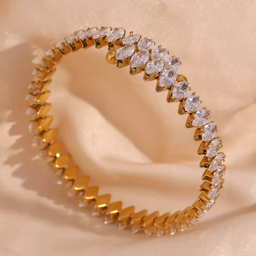 18K gold-plated zircon bracelet and ring jewelry set with sparkling stones, elegant accessories for stylish occasions.