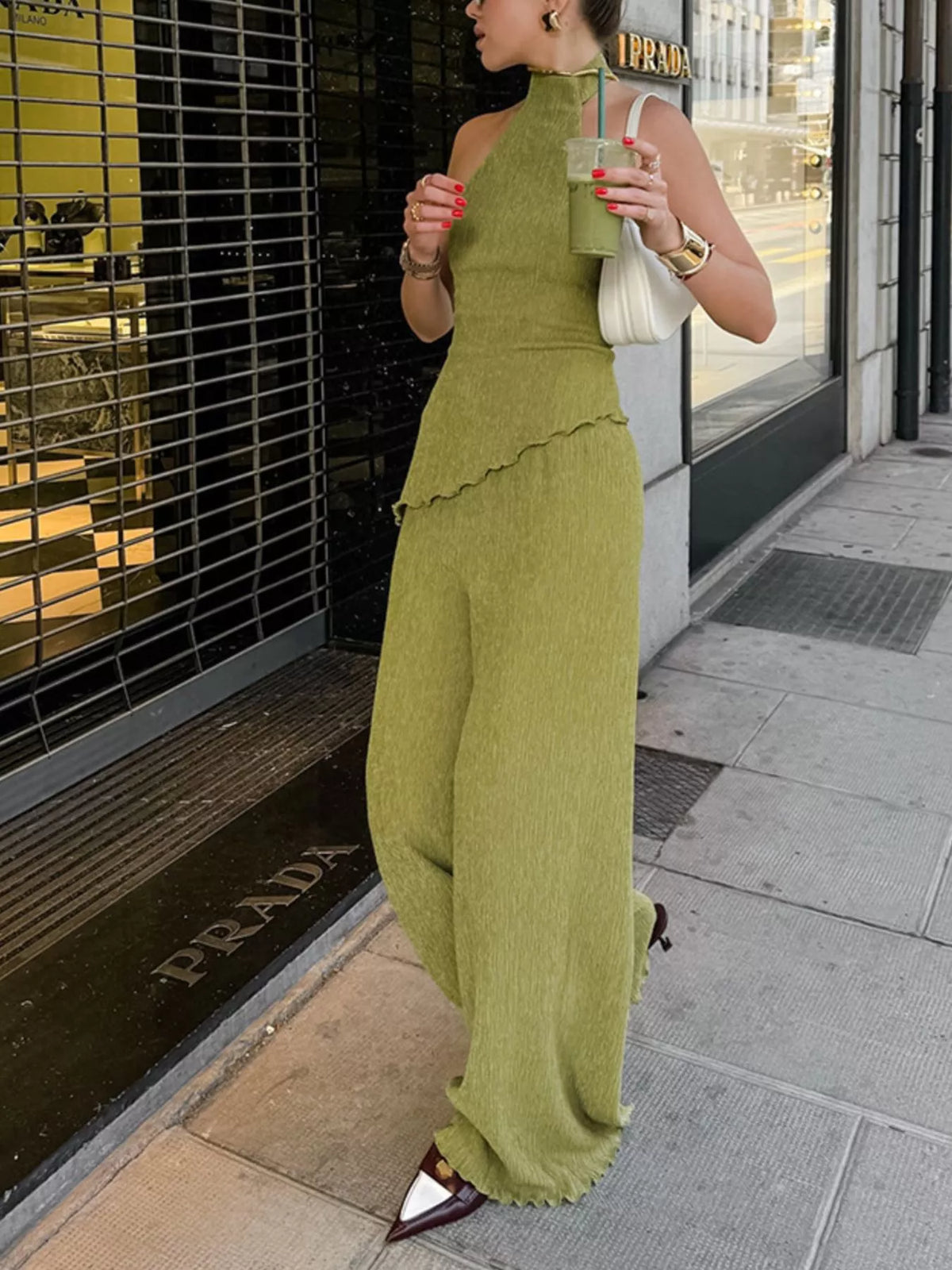 Trendsi sleeveless top and wide-leg pants two-piece set, featuring a stylish sleeveless blouse and flowy wide-leg trousers.