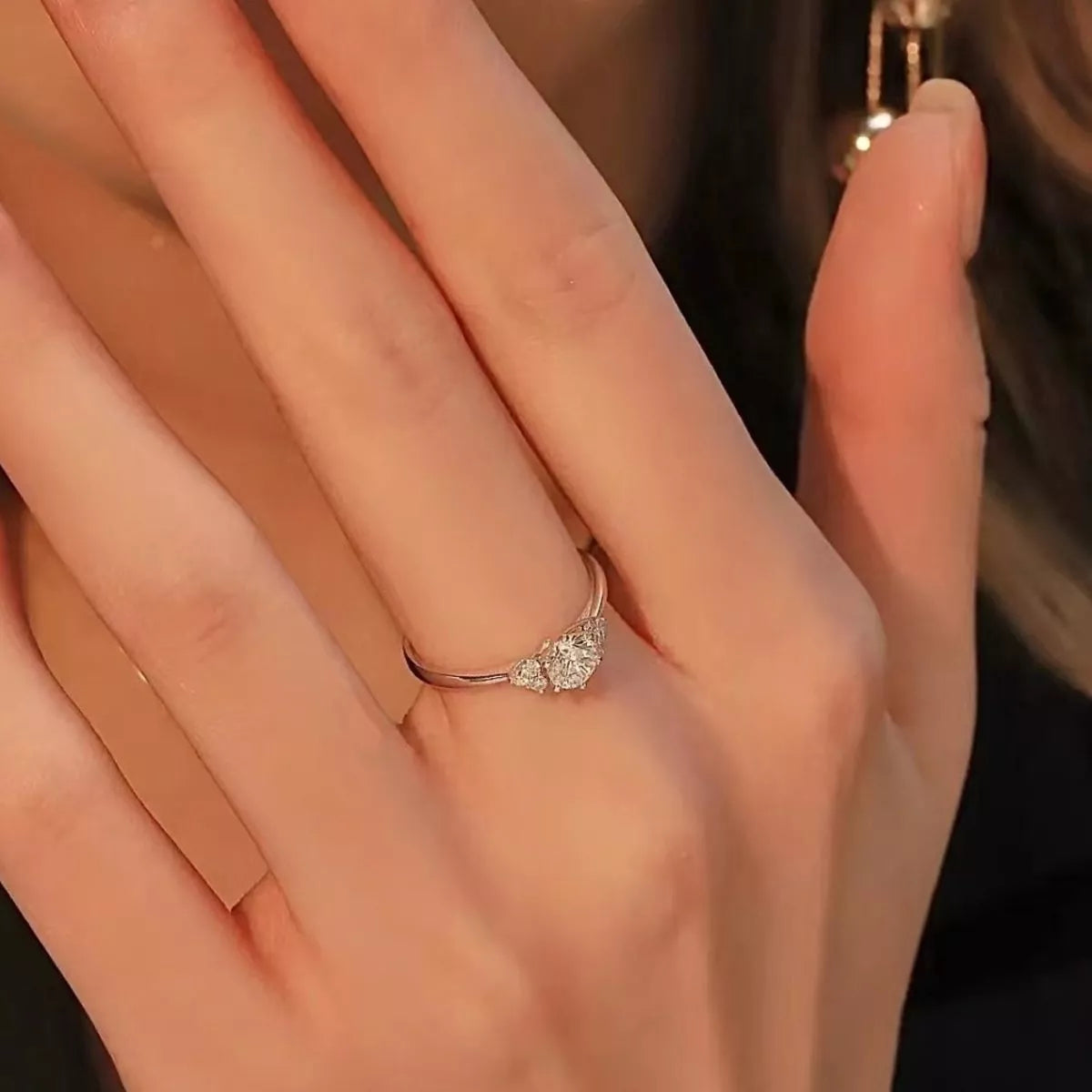 Sterling silver ring with 1 carat moissanite gemstone, featuring a sleek and elegant design.