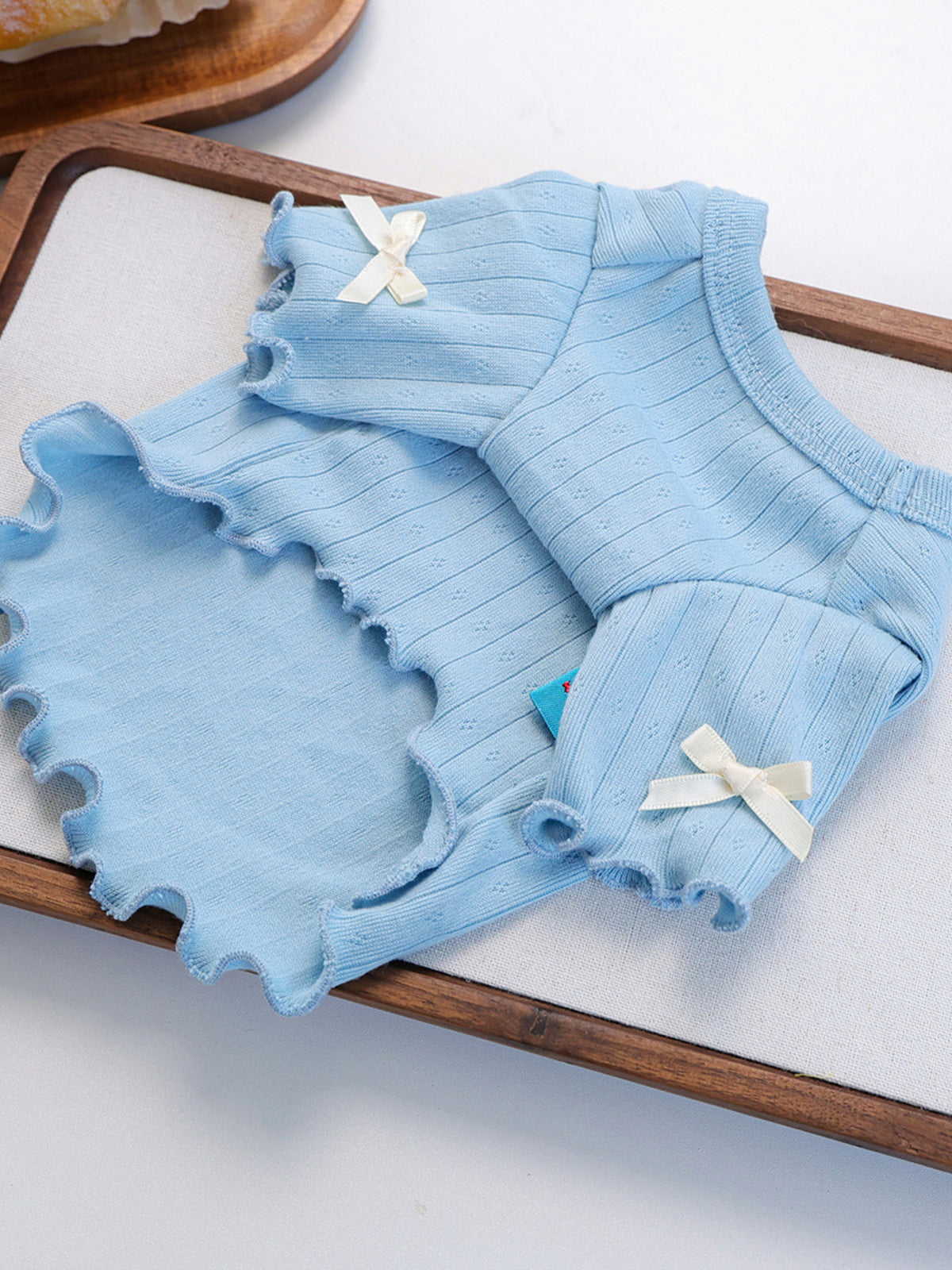 Sweet Bear Patch ribbed pet top from Trendsi, featuring a cute bear patch and ribbed fabric, designed for small pets.
