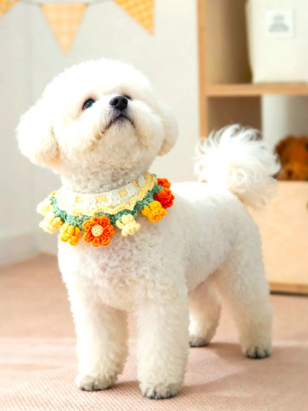 Handmade crochet floral pet scarf featuring colorful floral patterns, designed for small dogs and cats, by Trendsi.