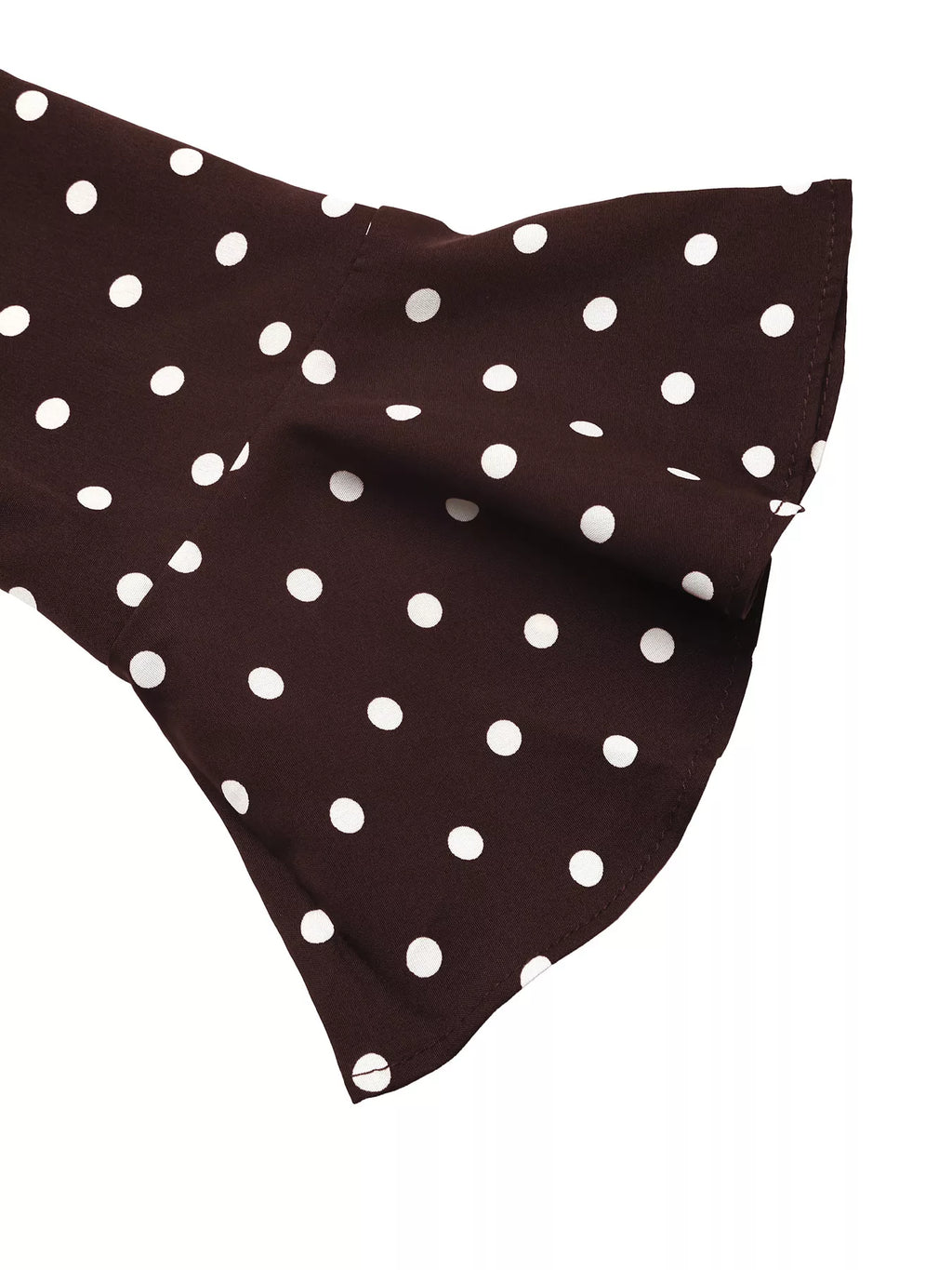 Polka dot long sleeve maxi dress by Trendsi featuring a flowing silhouette and classic black and white dot pattern.