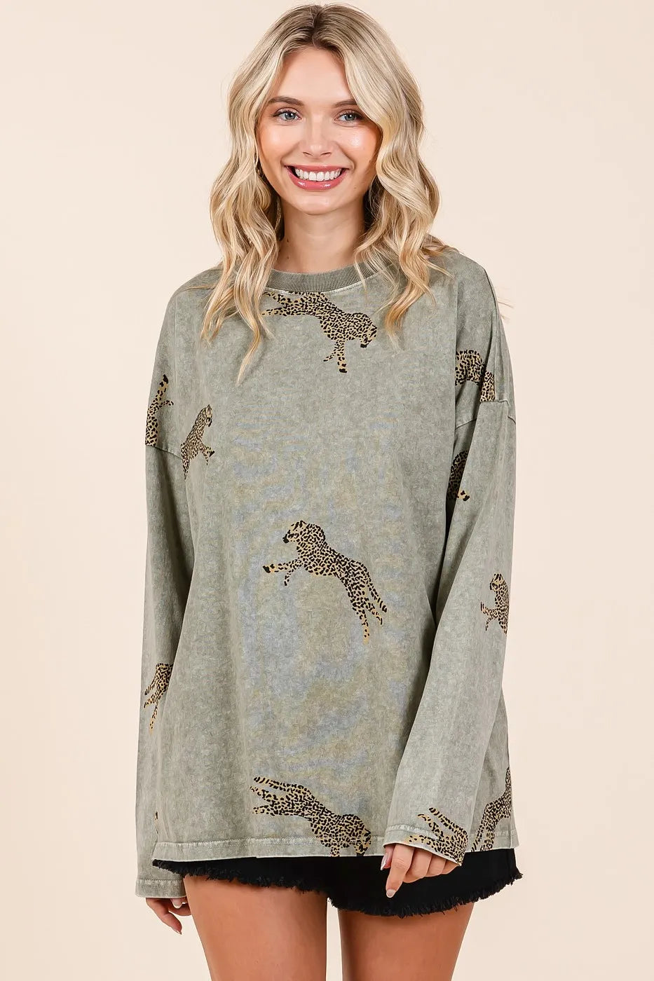 Mineroshop mineral wash cheetah print long sleeve top with relaxed fit, showcasing the trendy animal print design.