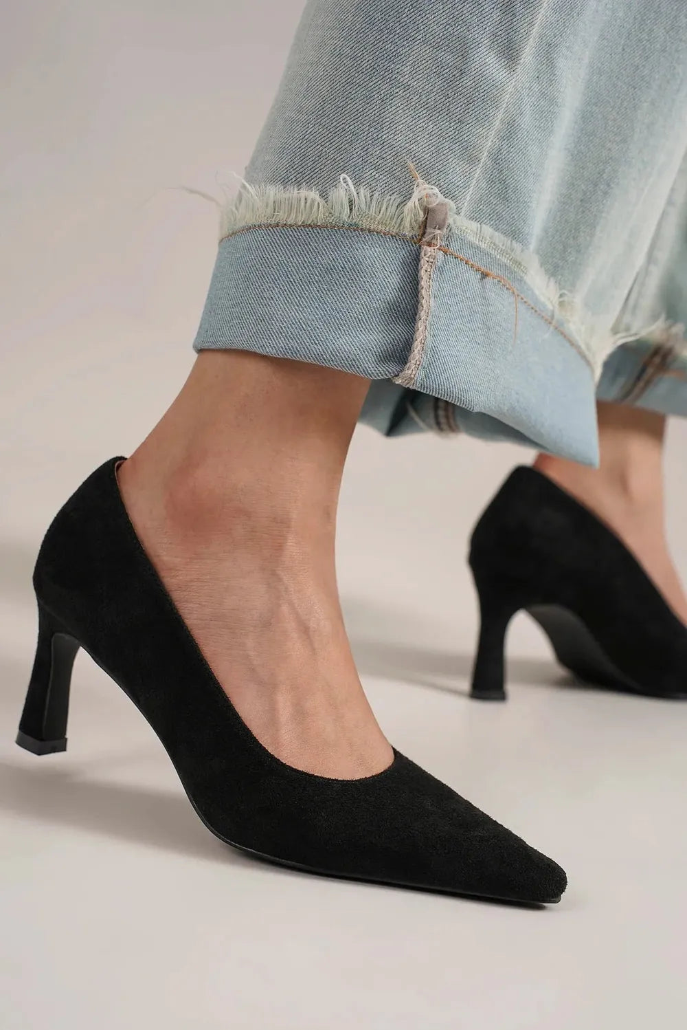 Beast Fashion faux suede point toe pumps featuring a sleek design and stiletto heel, perfect for stylish footwear.