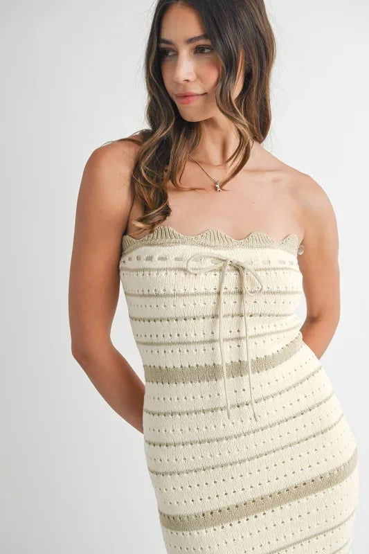 Contrast striped crochet knit midi dress by Trendsi featuring a fitted silhouette and stylish design.