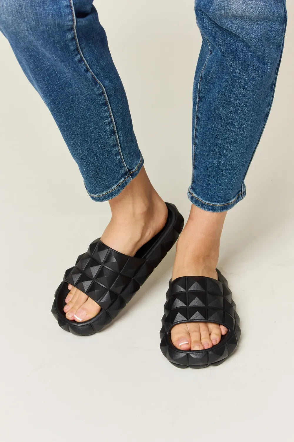 Trendsi Wild Diva pyramid stud toe band footbed sandals with black straps and chunky sole, stylish summer footwear for women.