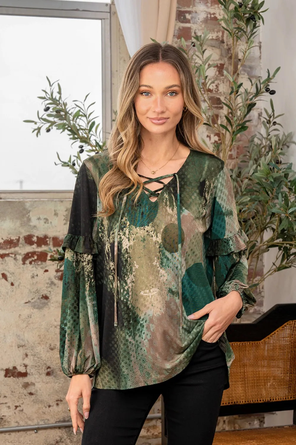 Sew In Love snakeskin print long sleeve top with ruffle detail, stylish full-size snakeskin print from Trendsi on a model.