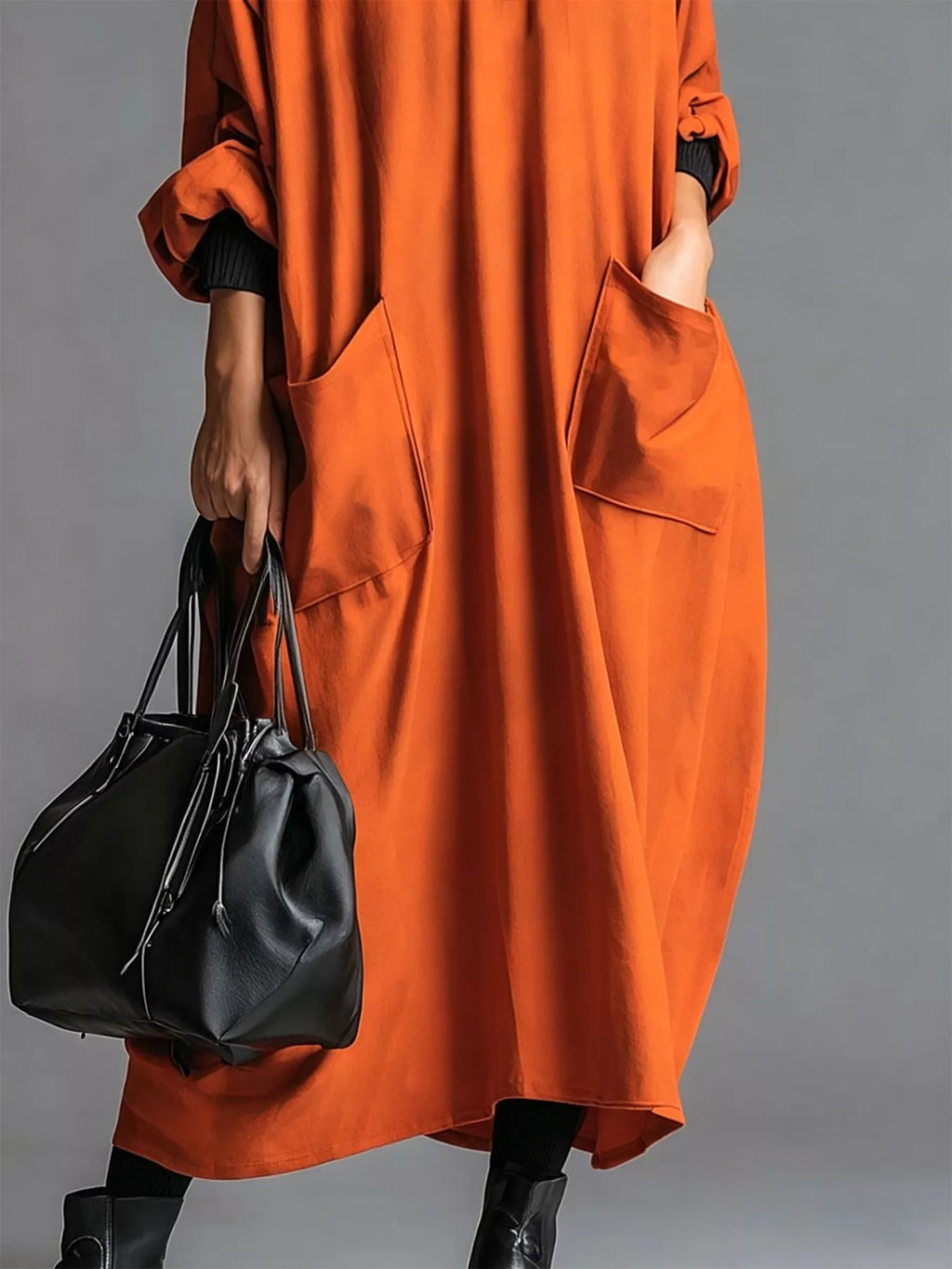 Plus size loose-fit mock neck midi dress with pockets from Trendsi, featuring a full size, casual and comfortable design.