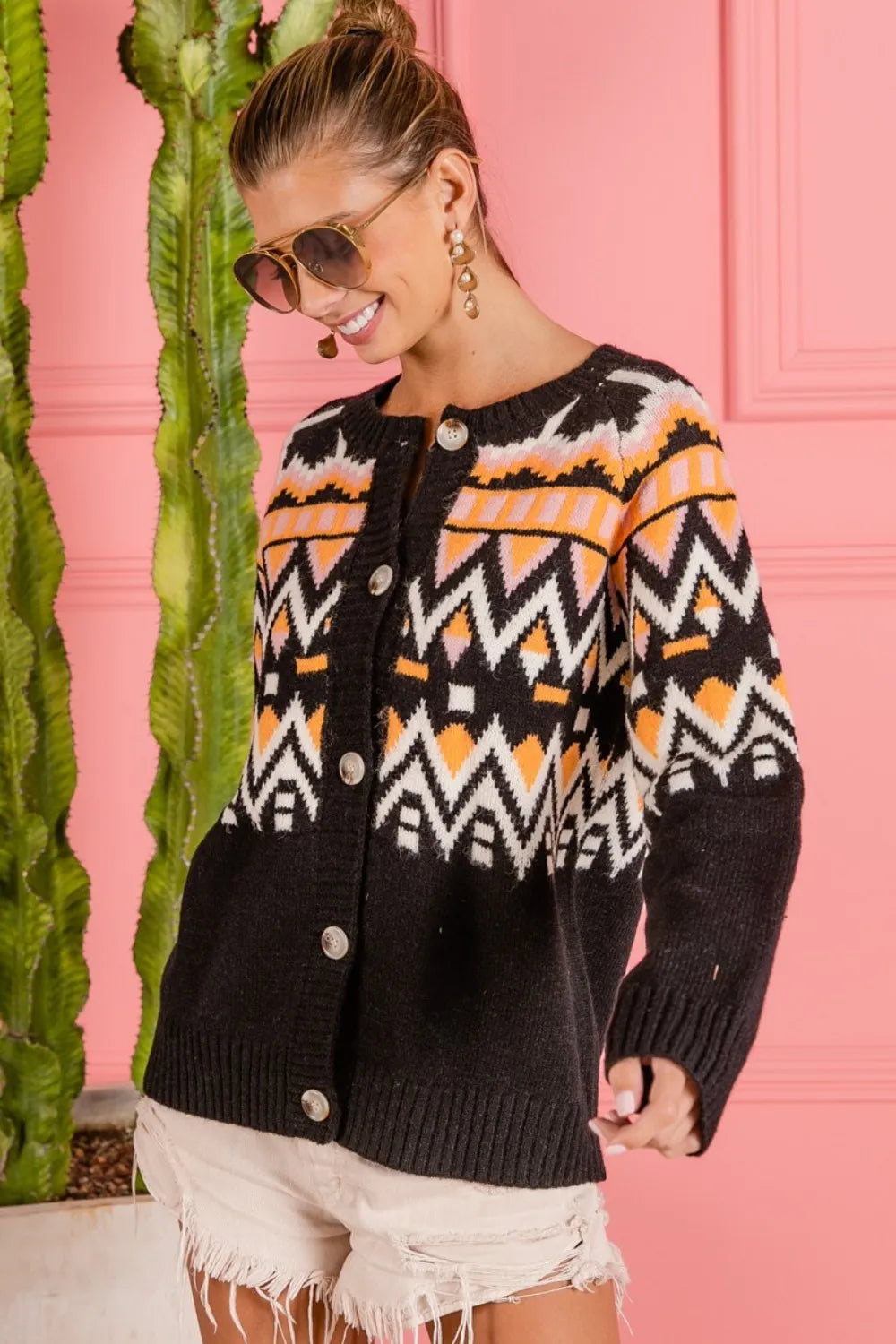 BiBi ethnic pattern button-up knit cardigan by Trendsi featuring colorful geometric designs and a cozy, stylish fit.