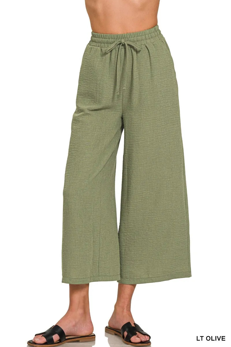 Woven crepe cropped pants with elastic waistband from Zenana, featuring a relaxed fit and stylish design.