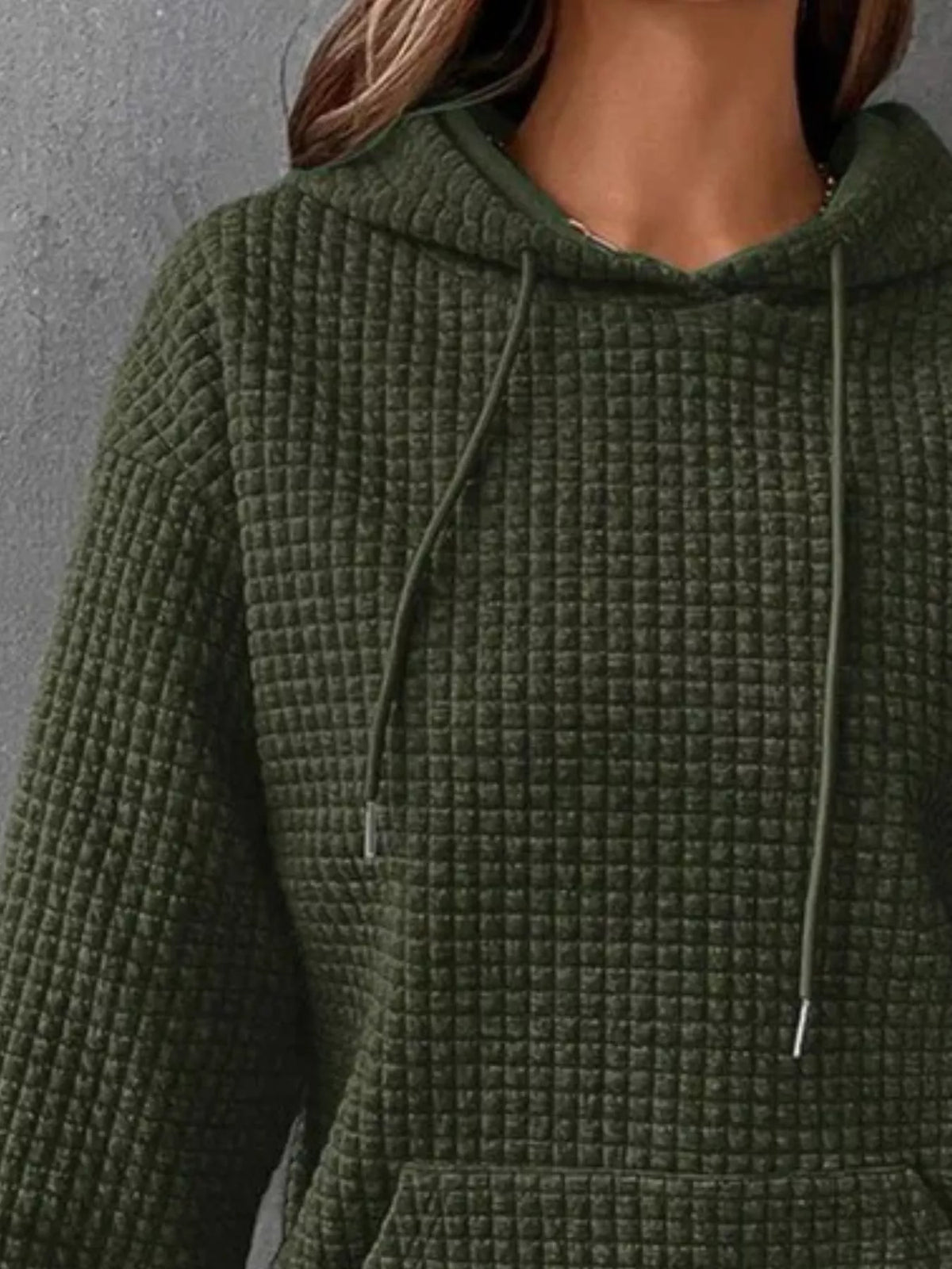 Full size textured kangaroo pocket hoodie in plus size by Trendsi, featuring a soft, comfortable fabric and casual style.