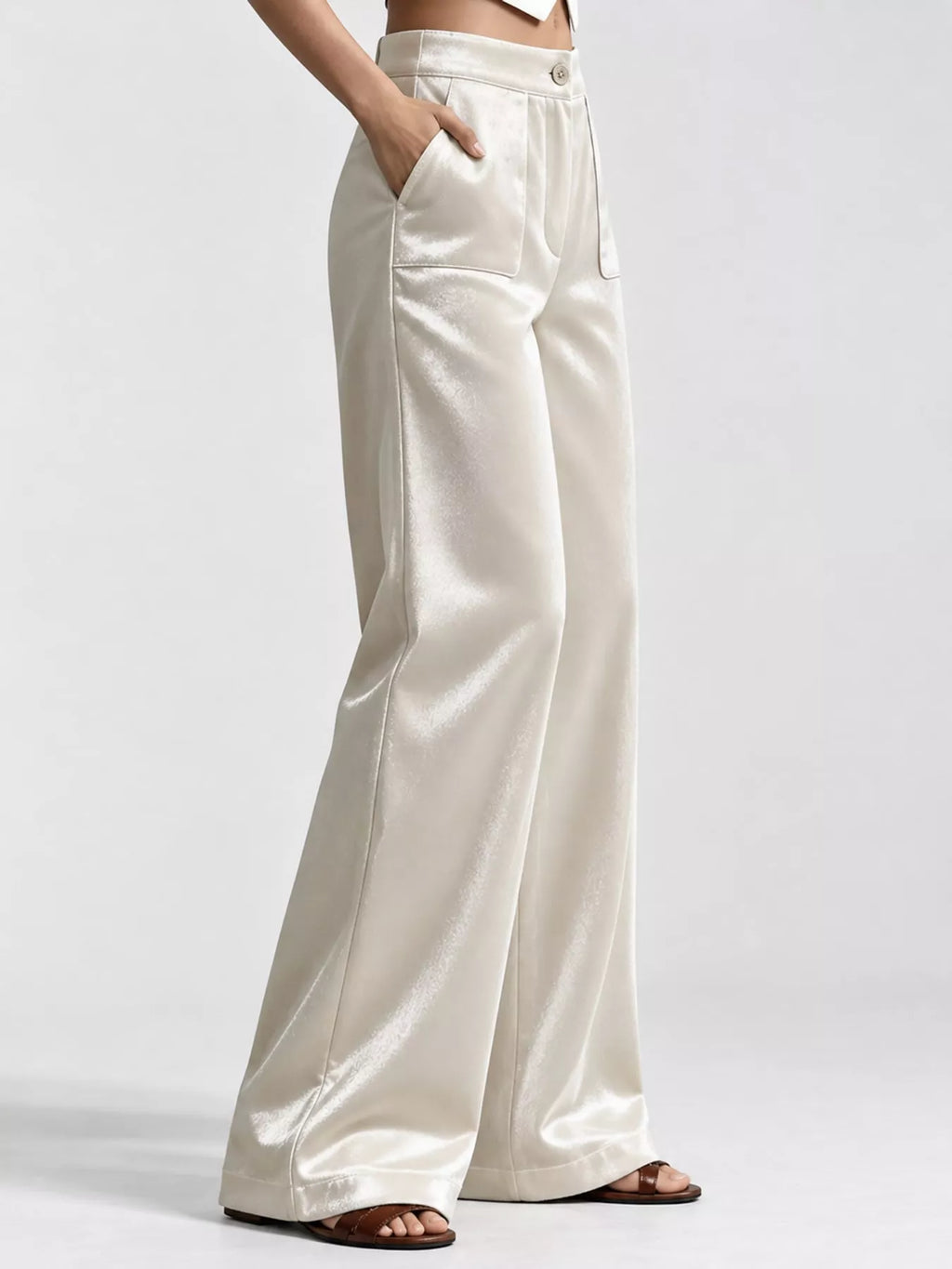 Full size high-waisted wide-leg velvet pants with pockets from Trendsi, featuring a plush fabric and relaxed fit for stylish comfort.