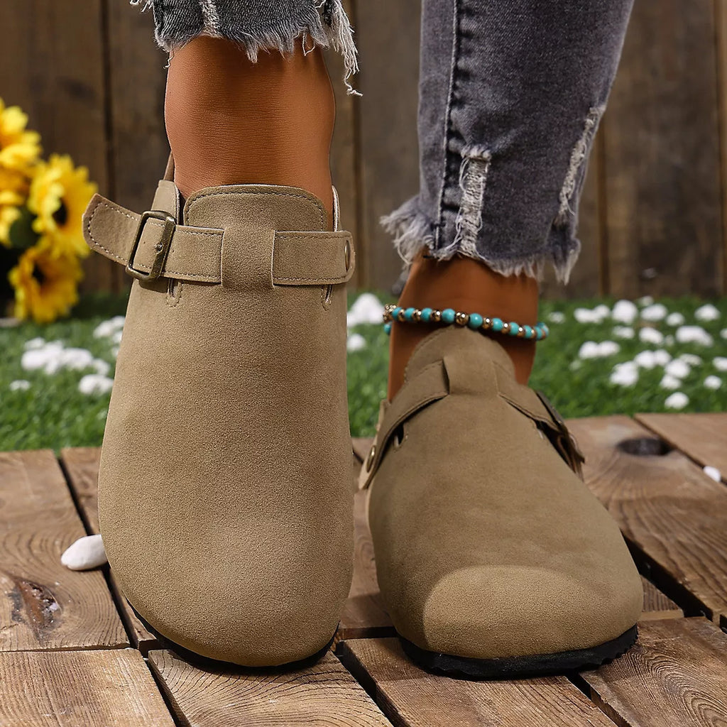 Trendsi round toe slip-on shoes featuring a sleek design and comfortable fit, shown in a close-up image.