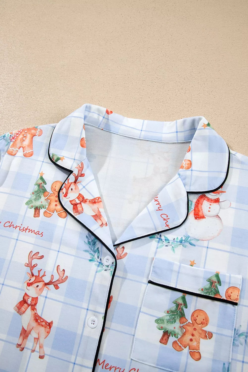 Light blue plaid cartoon Christmas pajama set with button-up top, view 4